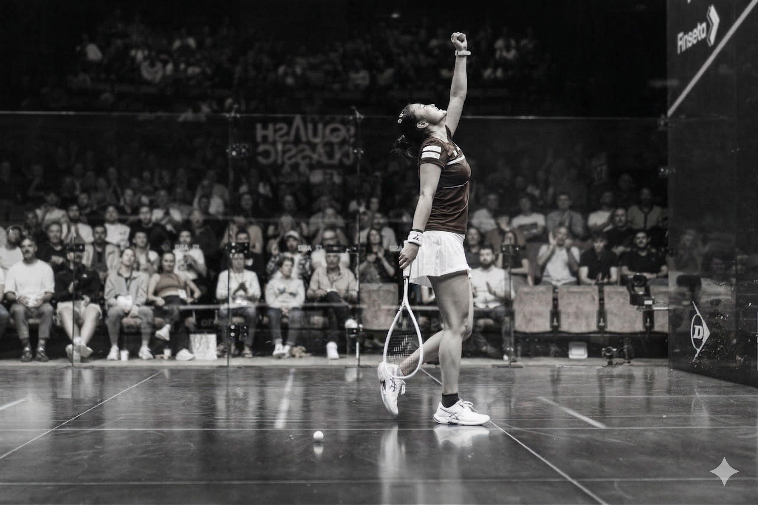 Girl celebrating a squash match win